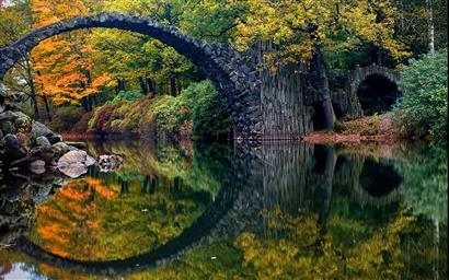black concrete arch bridge, body of water surrounded by trees, HD wallpaper